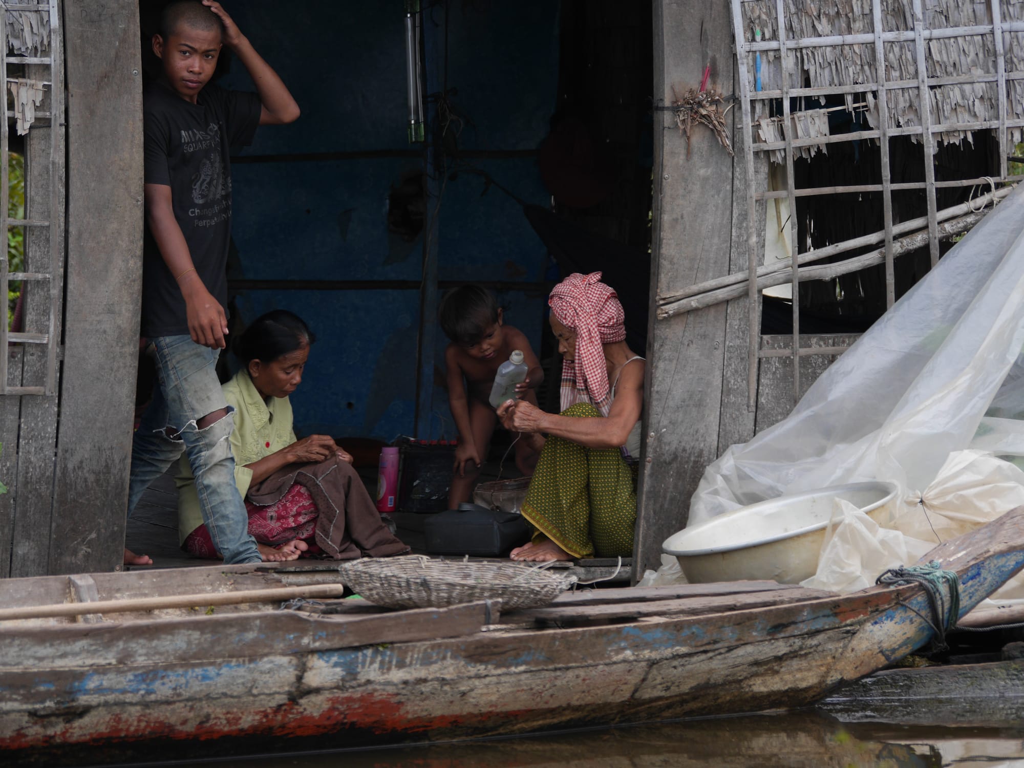 Photo by Author — a family — Mechrey Floating Village, Siem Reap, Cambodia