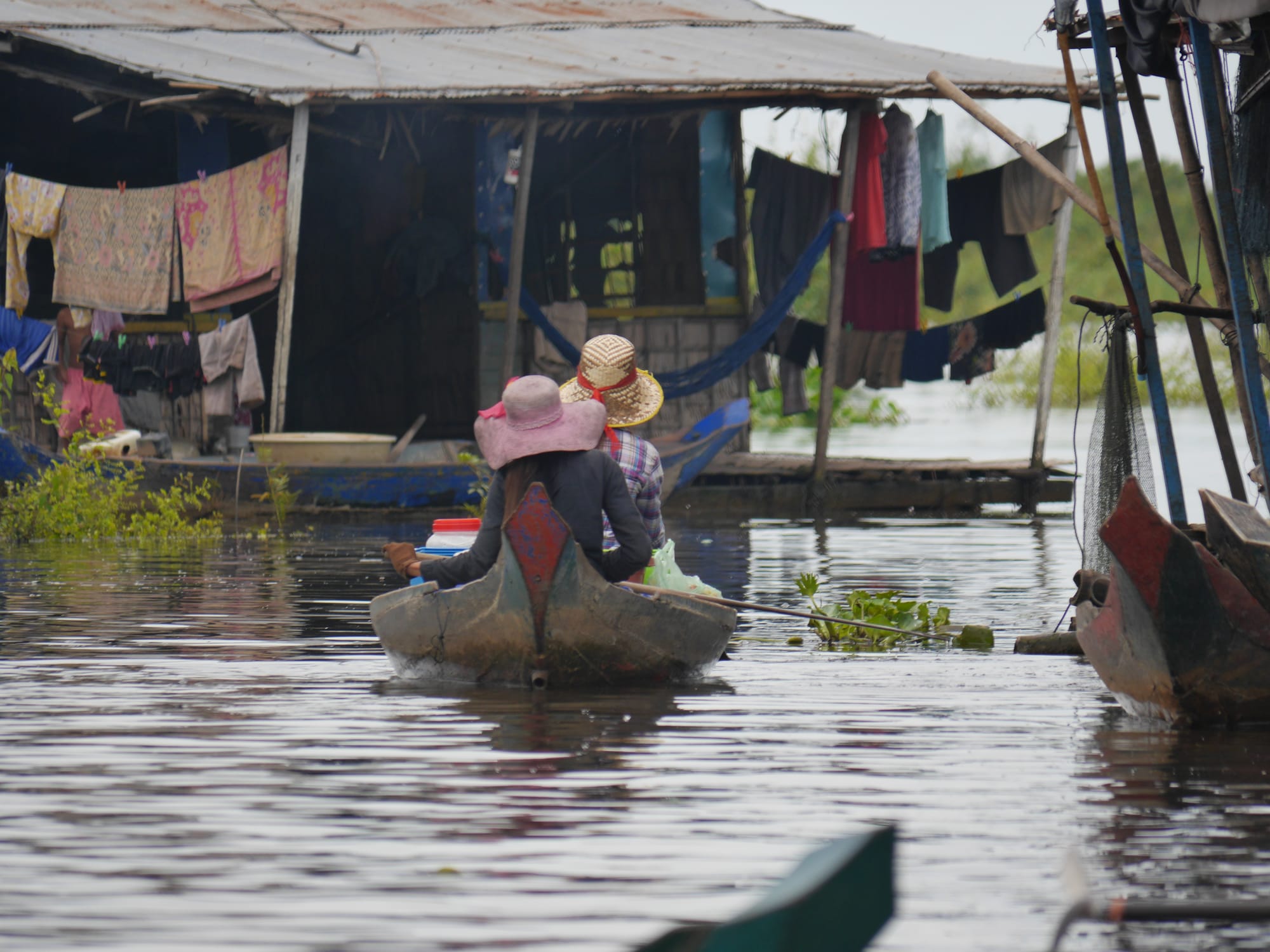 Photo by Author — locals moving around the village — Mechrey Floating Village, Siem Reap, Cambodia