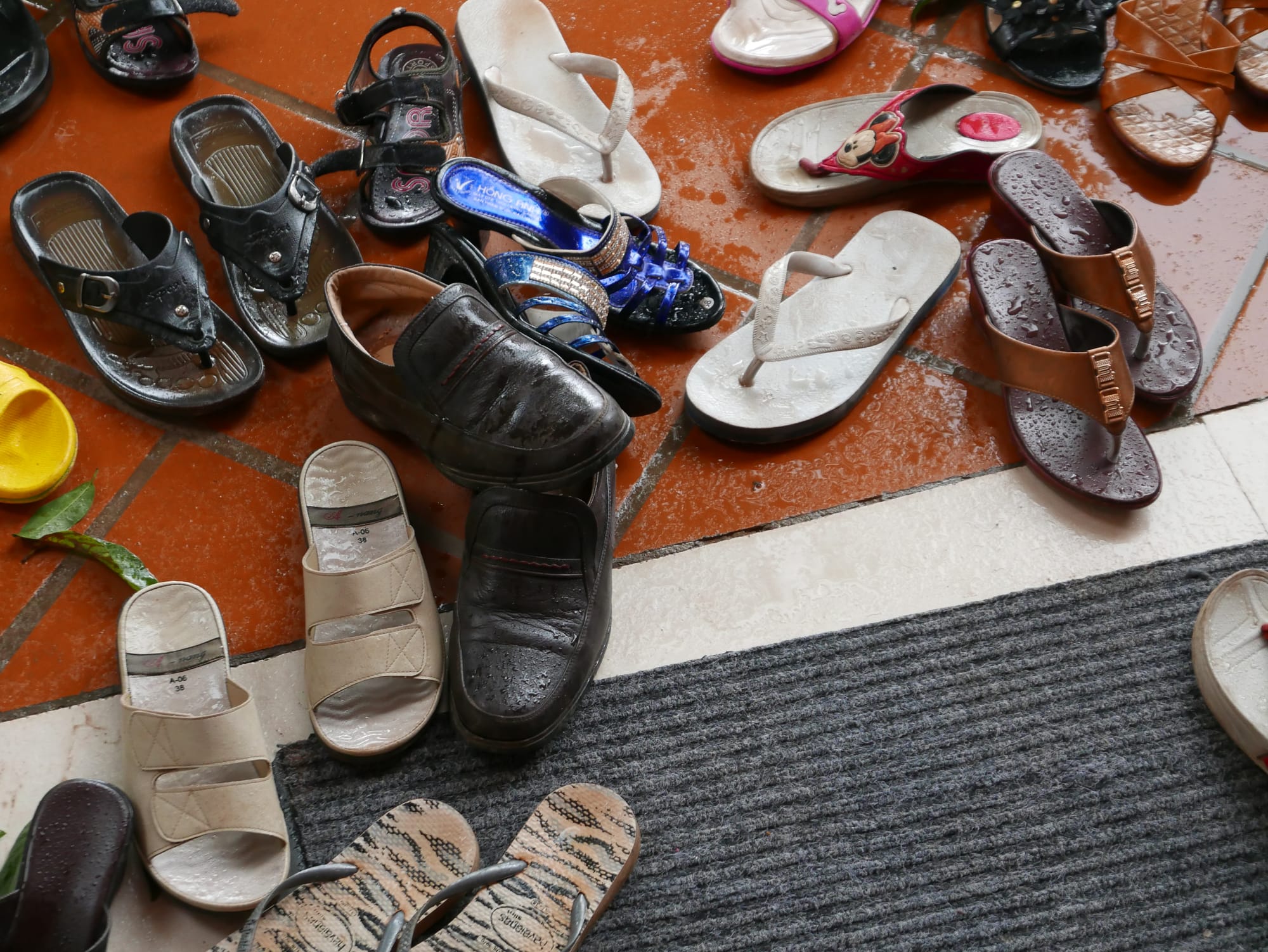 Photo by Author — shoes at the temple — Wat Preah Prohm Rath (Wat Preah Prom Rath), Pokambor Avenue, Siem Reap, Cambodia