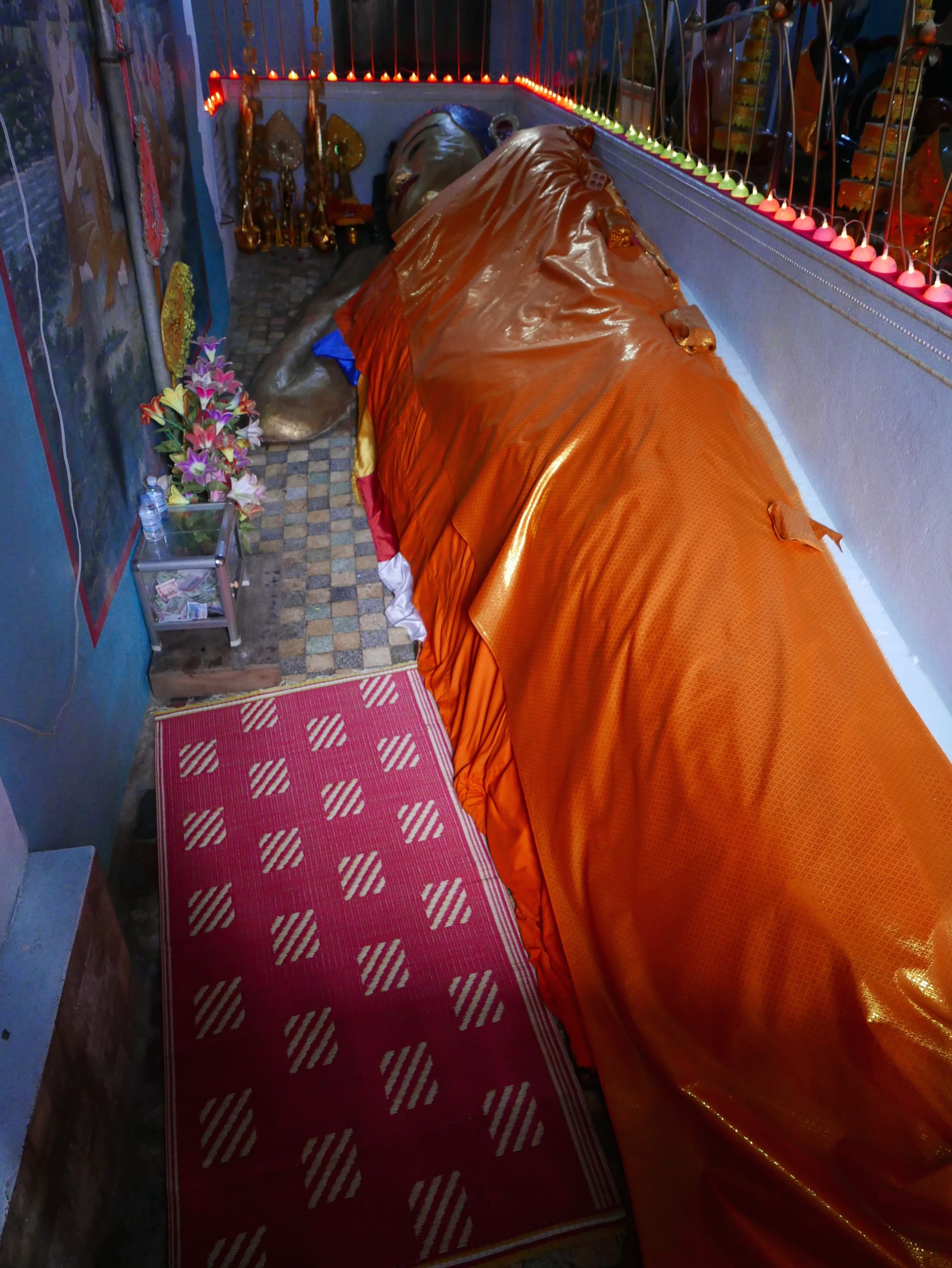 Photo by Author — reclining Buddha — Wat Preah Prohm Rath (Wat Preah Prom Rath), Pokambor Avenue, Siem Reap, Cambodia