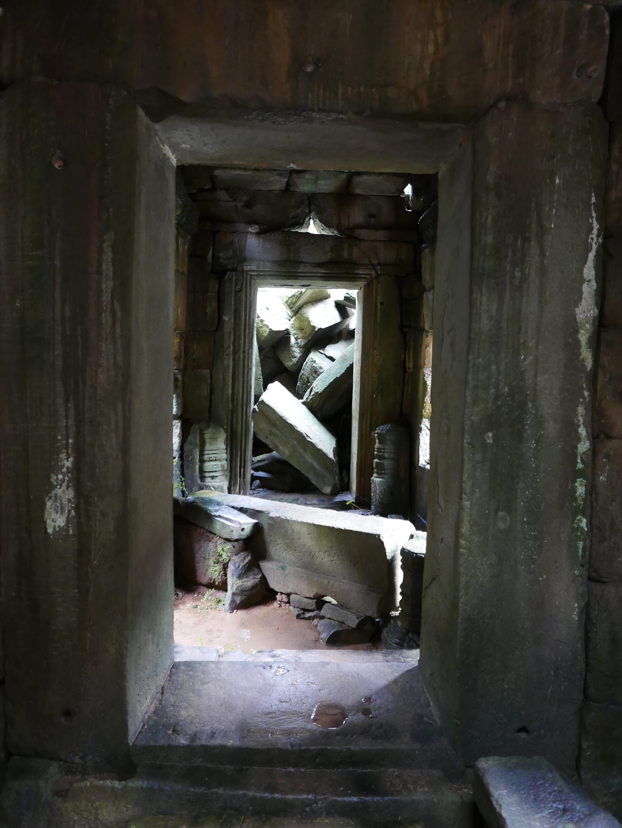 Photo by Author — collapsed section of Preah Khan (ប្រាសាទព្រះខ័ន), Angkor Archaeological Park, Angkor, Cambodia