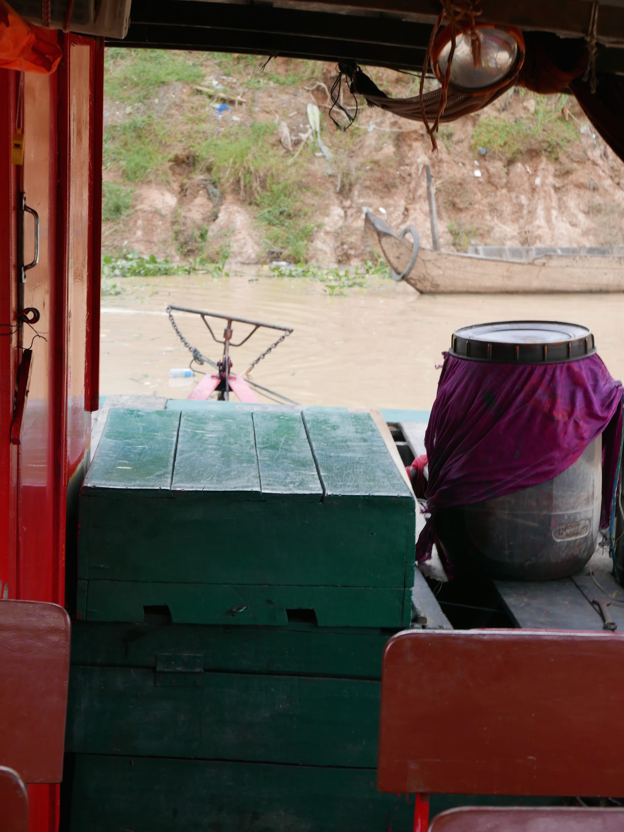 Photo by Author — view of the stern of my boat out to Mechrey Floating Village, Siem Reap, Cambodia