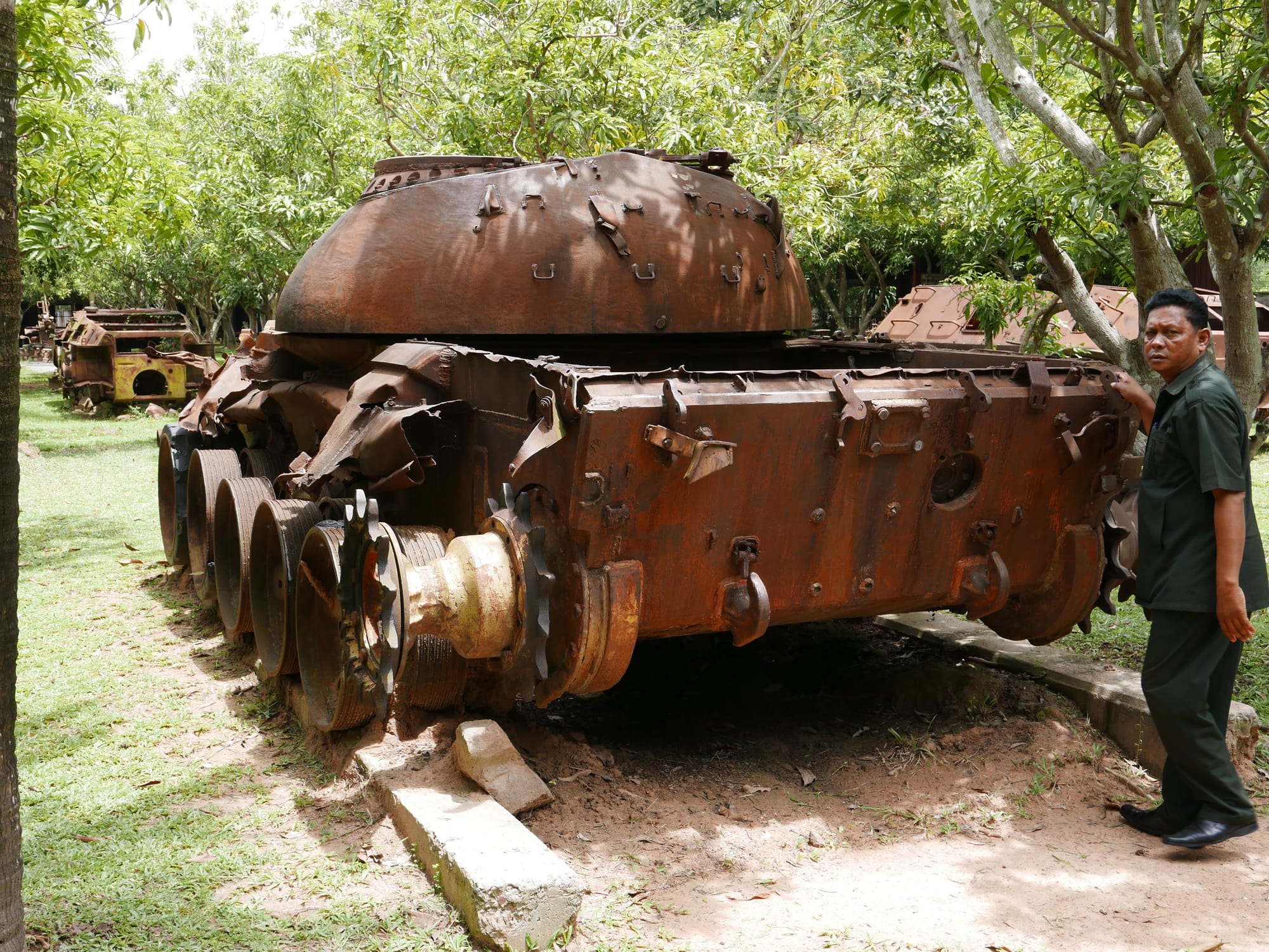 Photo by Author — the remains of a partly destroyed tank — War Museum, Siem Reap, Cambodia