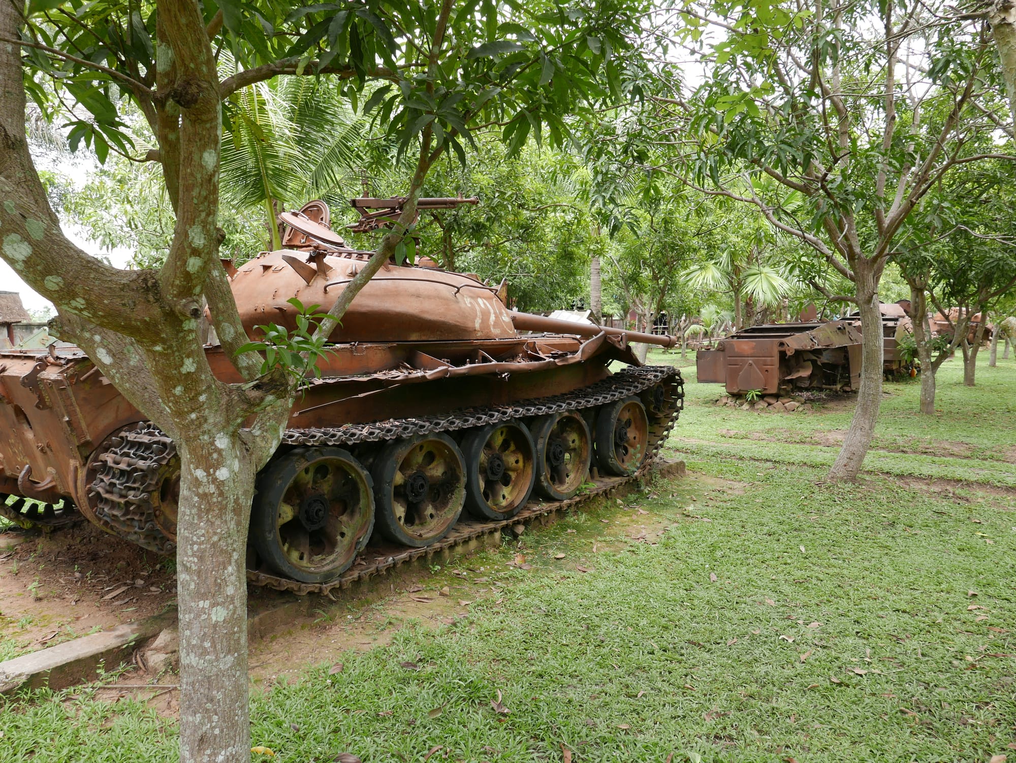 Photo by Author — the remains of a partly destroyed tank — War Museum, Siem Reap, Cambodia