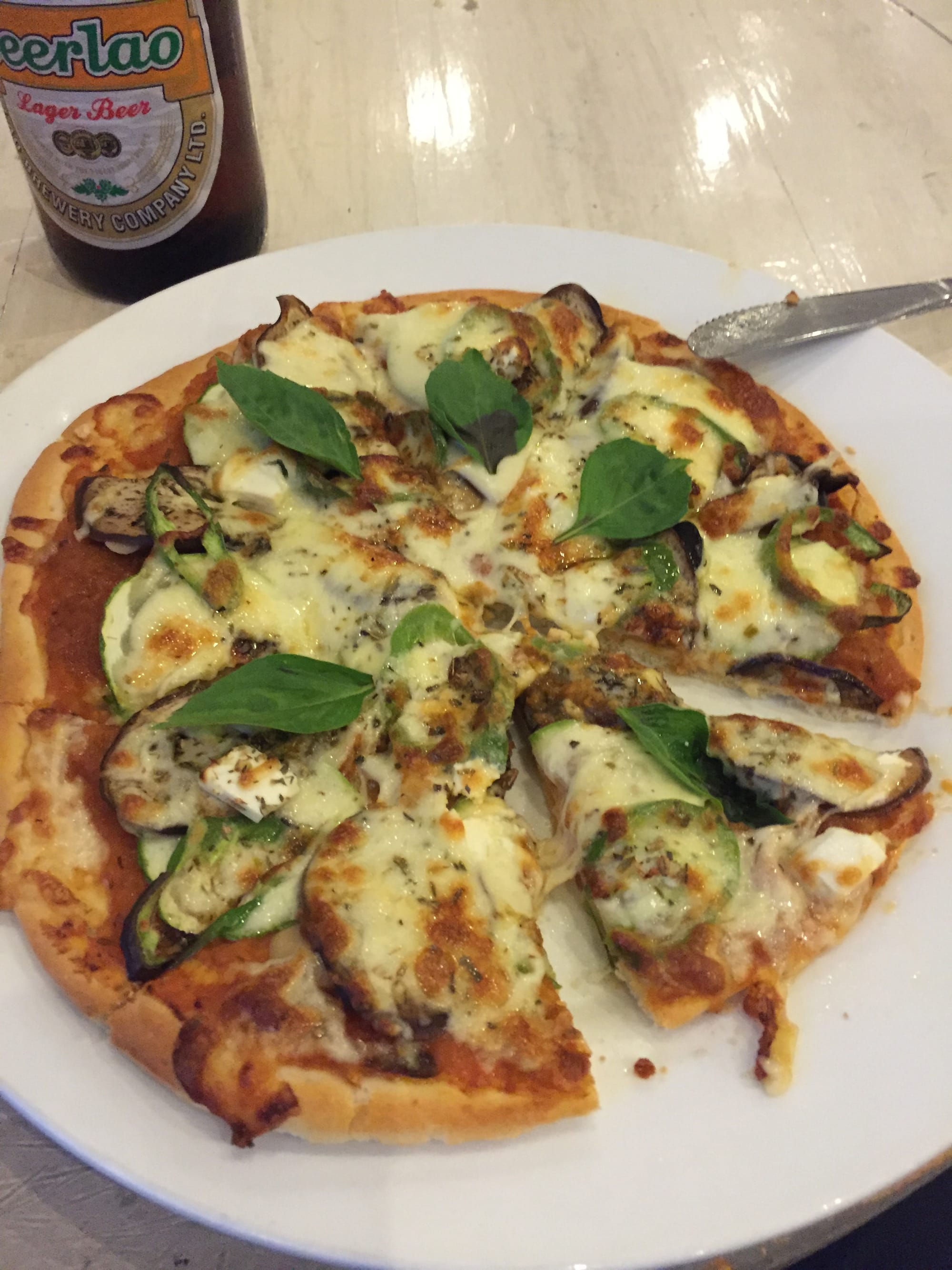 Photo by Author — pizza at the Indigo Café, Luang Prabang (ຫລວງພະບາງ/ຫຼວງພະບາງ), Laos