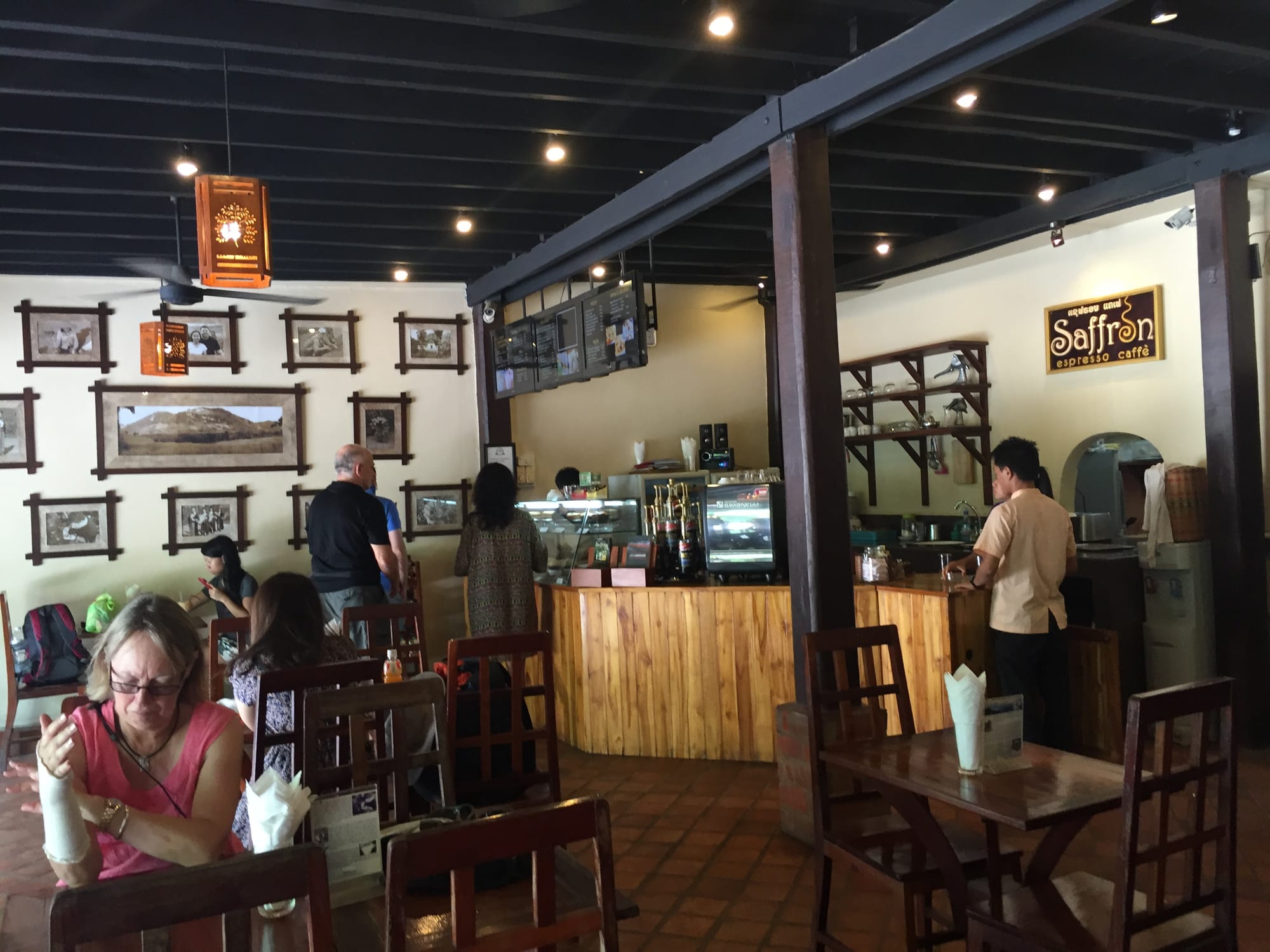 Photo by Author — inside the Saffron Café, Luang Prabang (ຫລວງພະບາງ/ຫຼວງພະບາງ), Laos