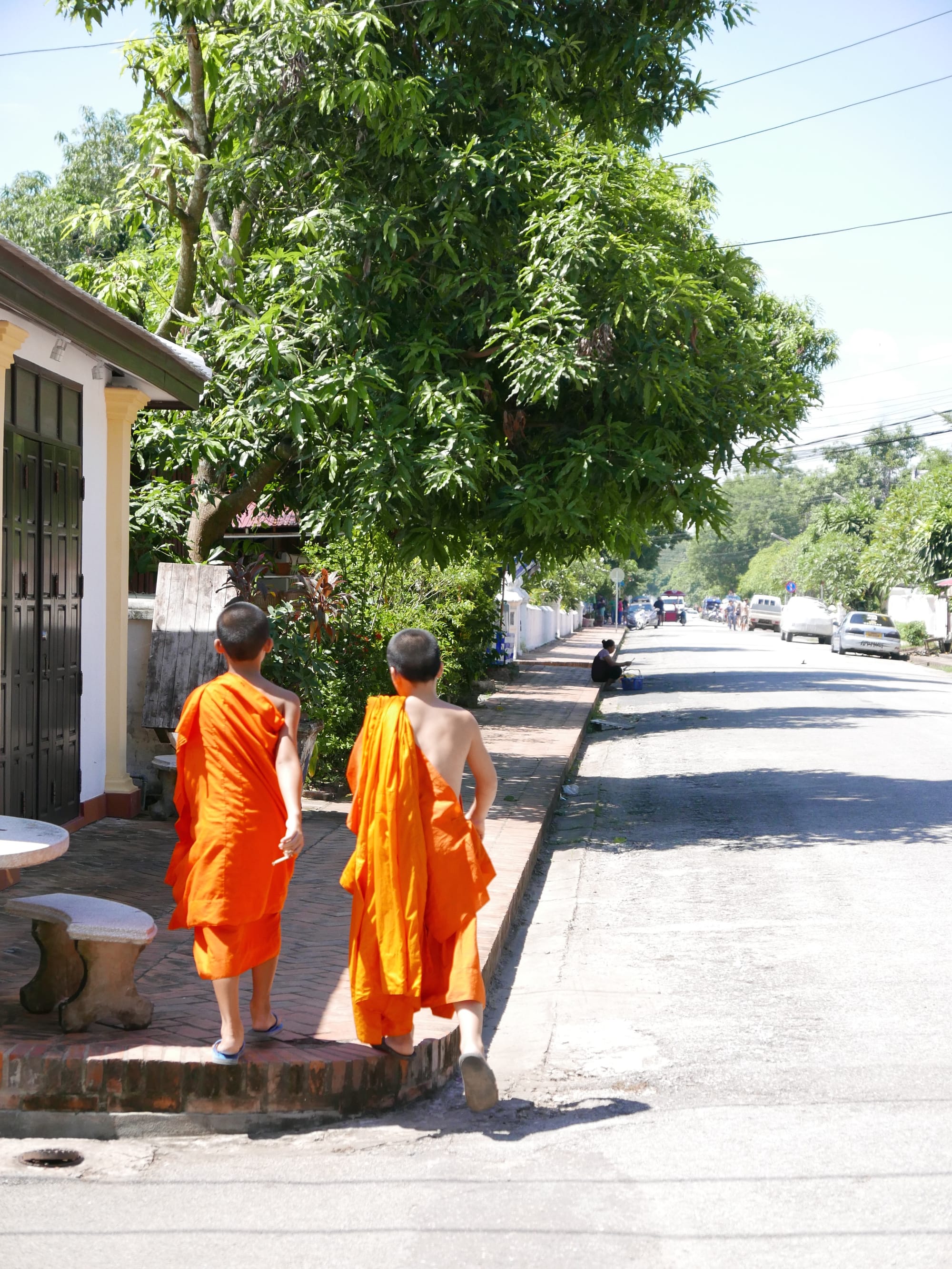 Photo by Author — monks out for a stroll — Luang Prabang (ຫລວງພະບາງ/ຫຼວງພະບາງ), Laos