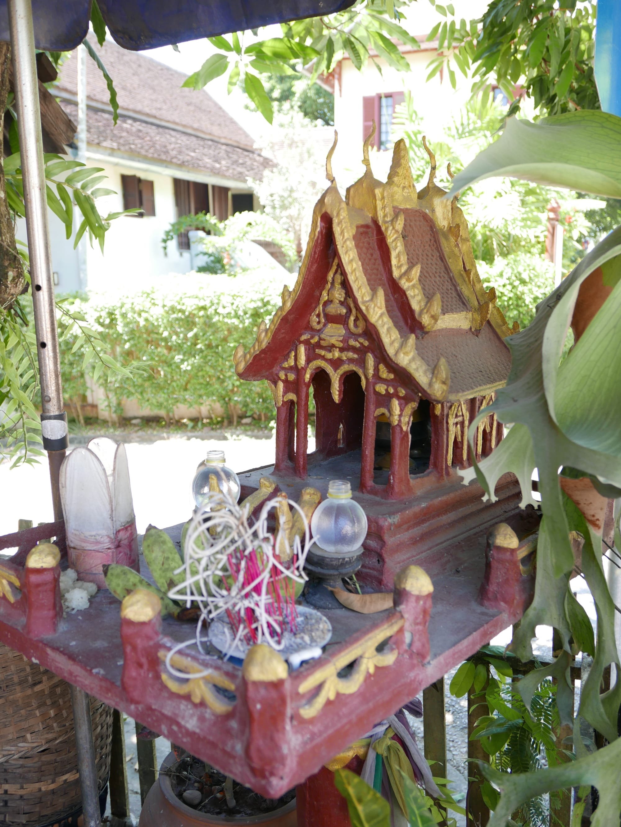 Photo by Author — a small shrine with offerings? — Luang Prabang (ຫລວງພະບາງ/ຫຼວງພະບາງ), Laos