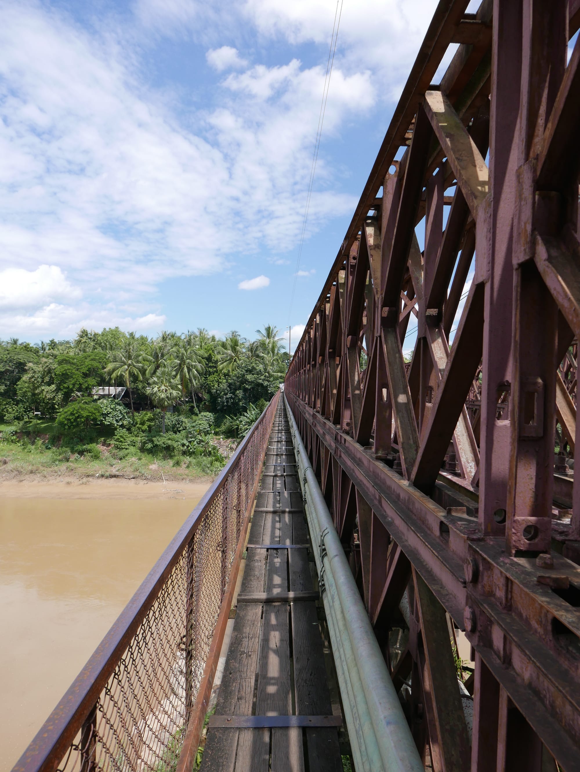 Photo by Author — pedestrian walkway — The Old Bridge, Luang Prabang (ຫລວງພະບາງ/ຫຼວງພະບາງ), Laos 