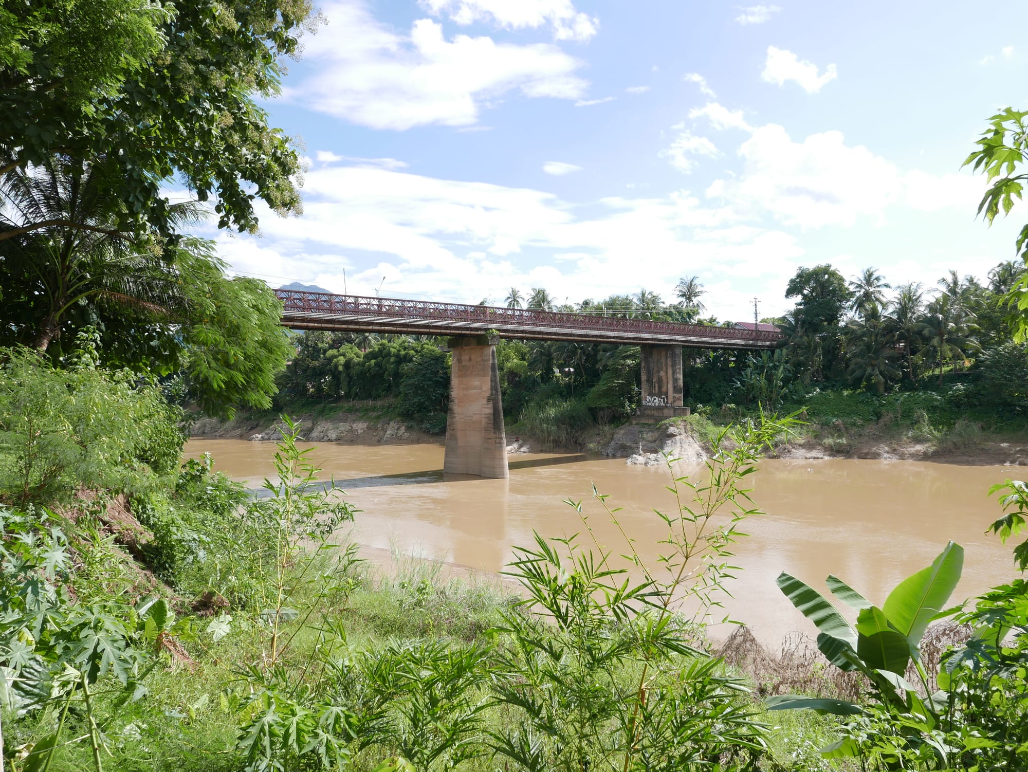 Photo by Author — The Old Bridge, Luang Prabang (ຫລວງພະບາງ/ຫຼວງພະບາງ), Laos, from the Nam Khan River