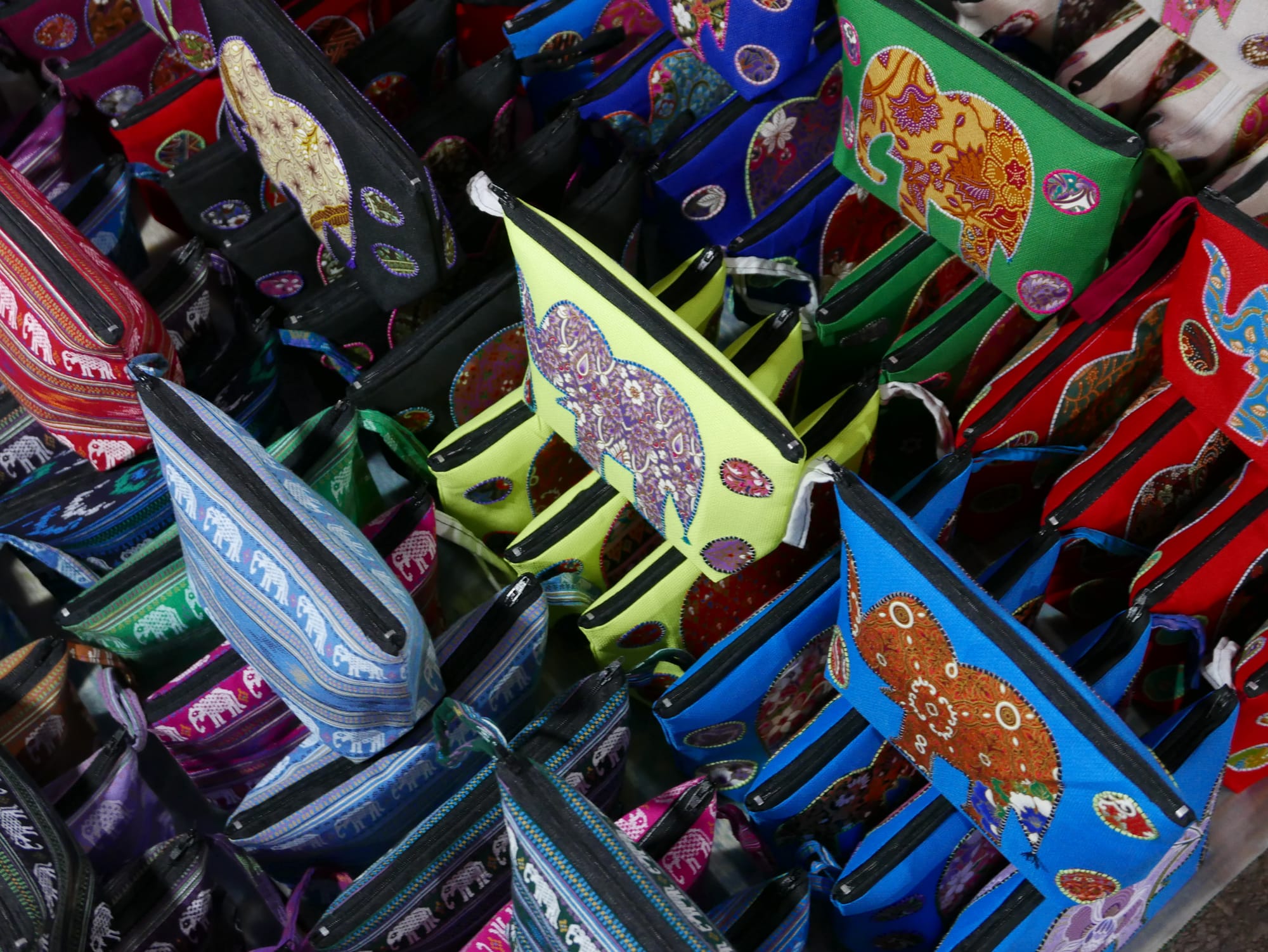 Photo by Author — small bag stall — Night Market, Luang Prabang (ຫລວງພະບາງ/ຫຼວງພະບາງ), Laos