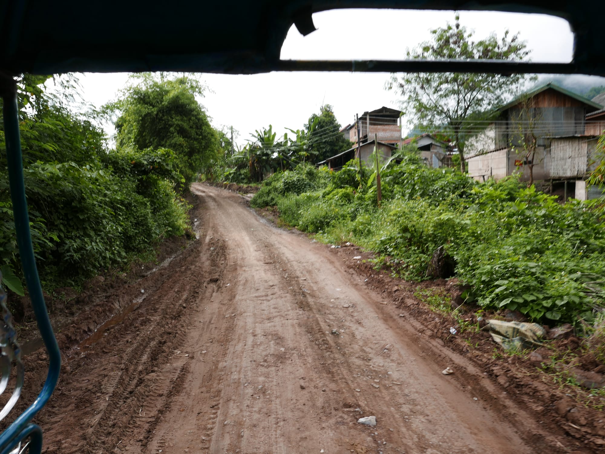 Photo by Author — the view from the back of the taxi — Tham Ting (Tam Ting)/Pak Ou (ถ้ำติ่ง) Caves, Laos