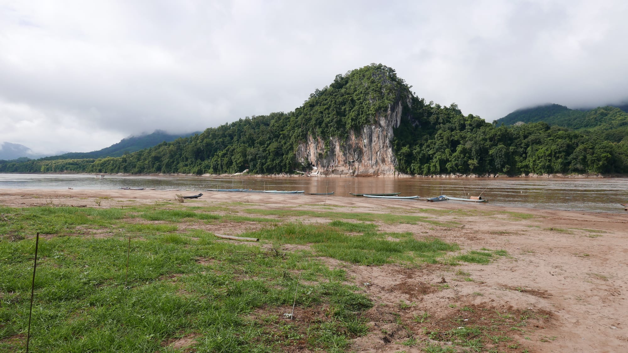 Photo by Author — the view across the Mekong River — Tham Ting (Tam Ting)/Pak Ou (ถ้ำติ่ง) Caves, Laos