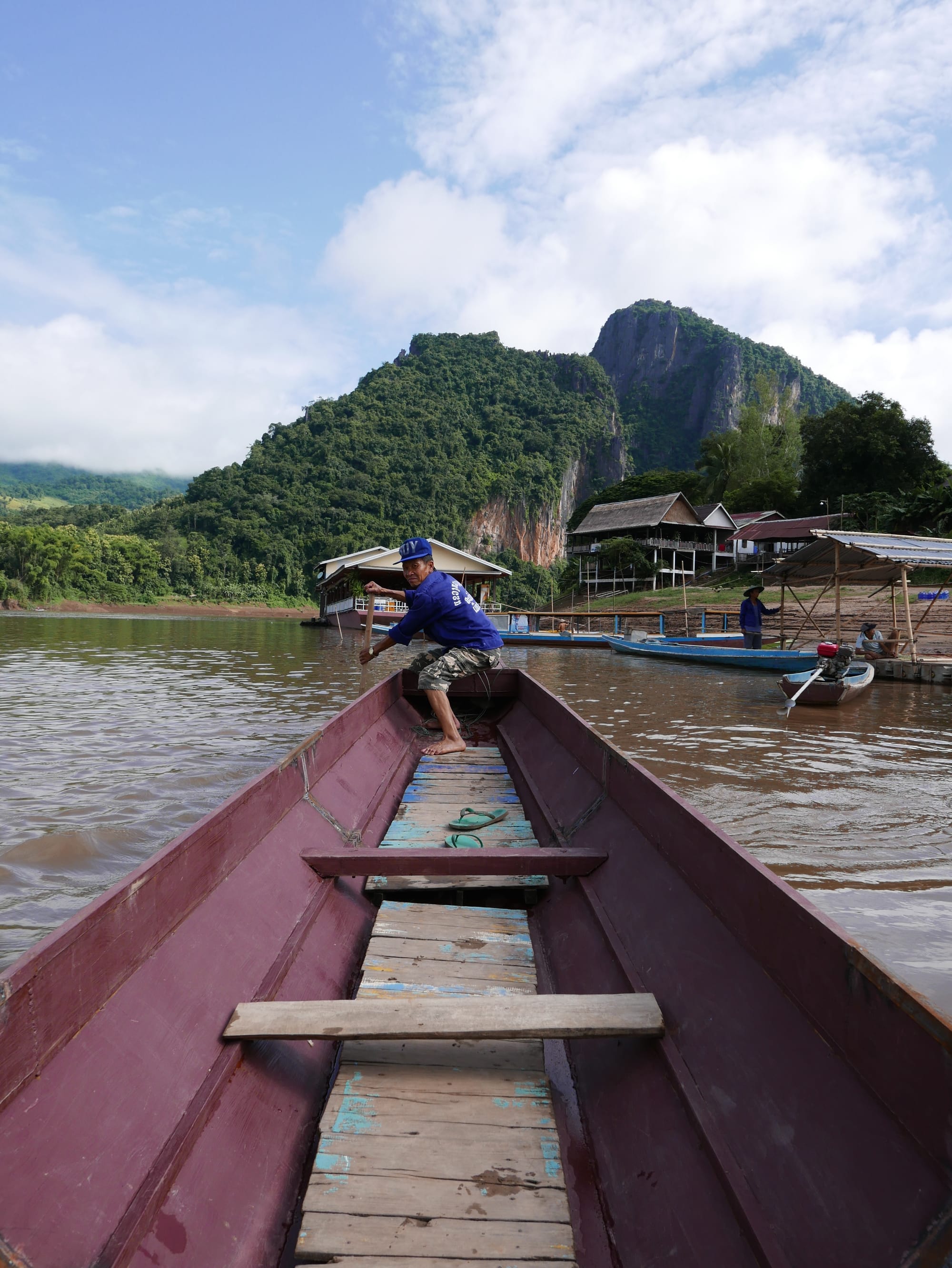 Photo by Author — crossing the Mekong River — my driver — Tham Ting (Tam Ting)/Pak Ou (ถ้ำติ่ง) Caves, Laos