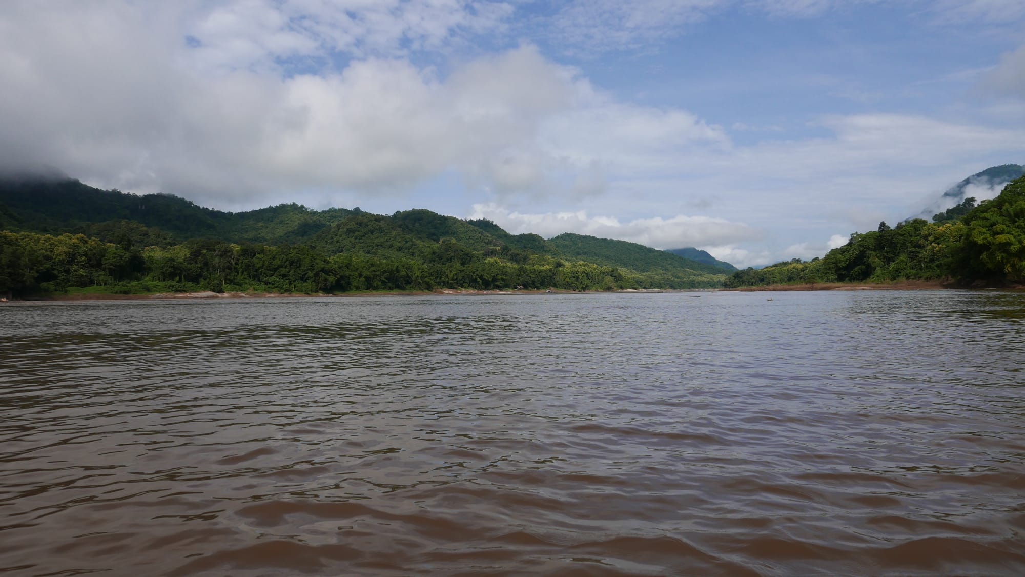 Photo by Author — crossing the Mekong River — Tham Ting (Tam Ting)/Pak Ou (ถ้ำติ่ง) Caves, Laos