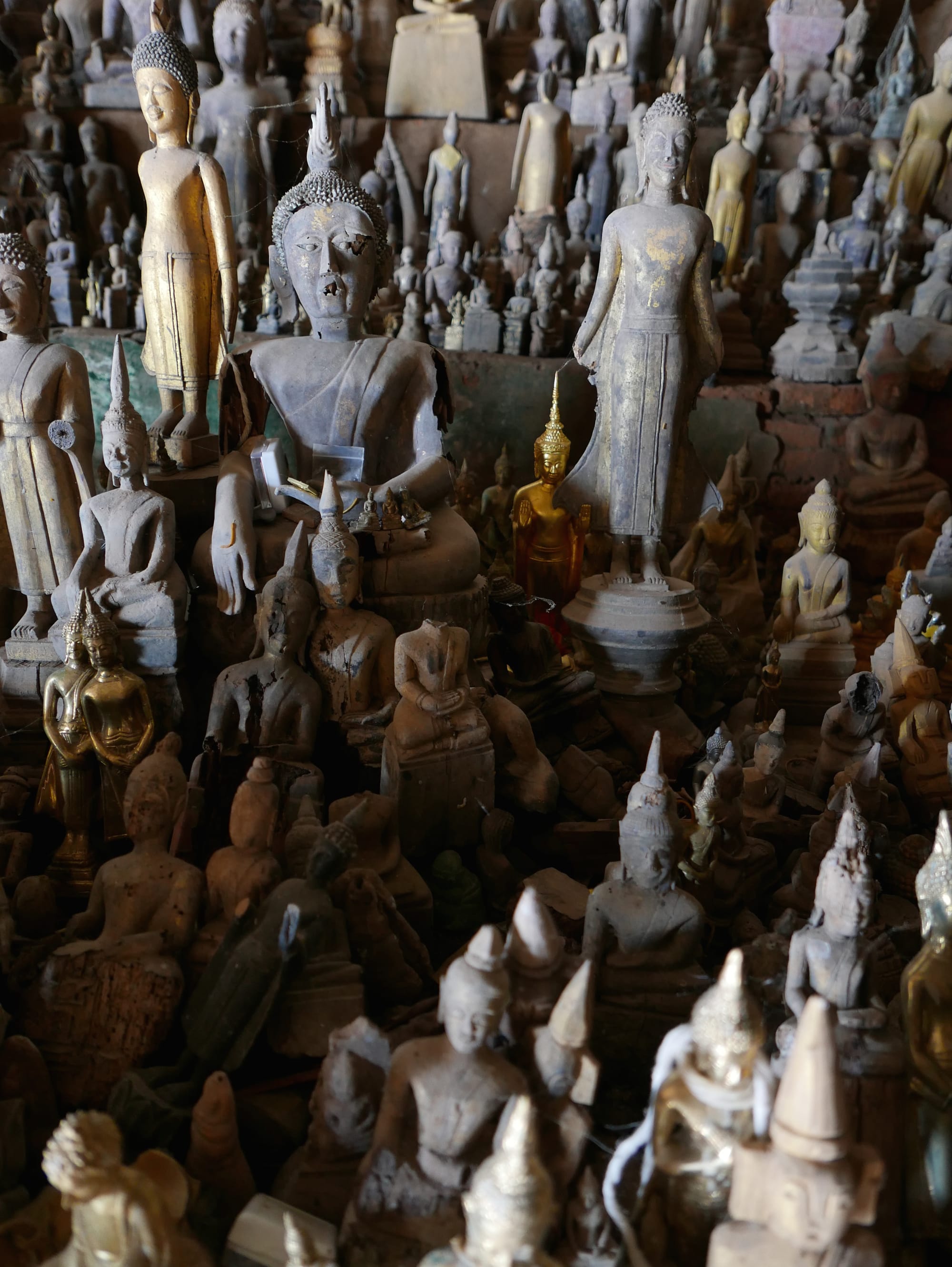 Photo by Author — Buddhas in the Tham Ting (Tam Ting)/Pak Ou (ถ้ำติ่ง) Caves, Laos