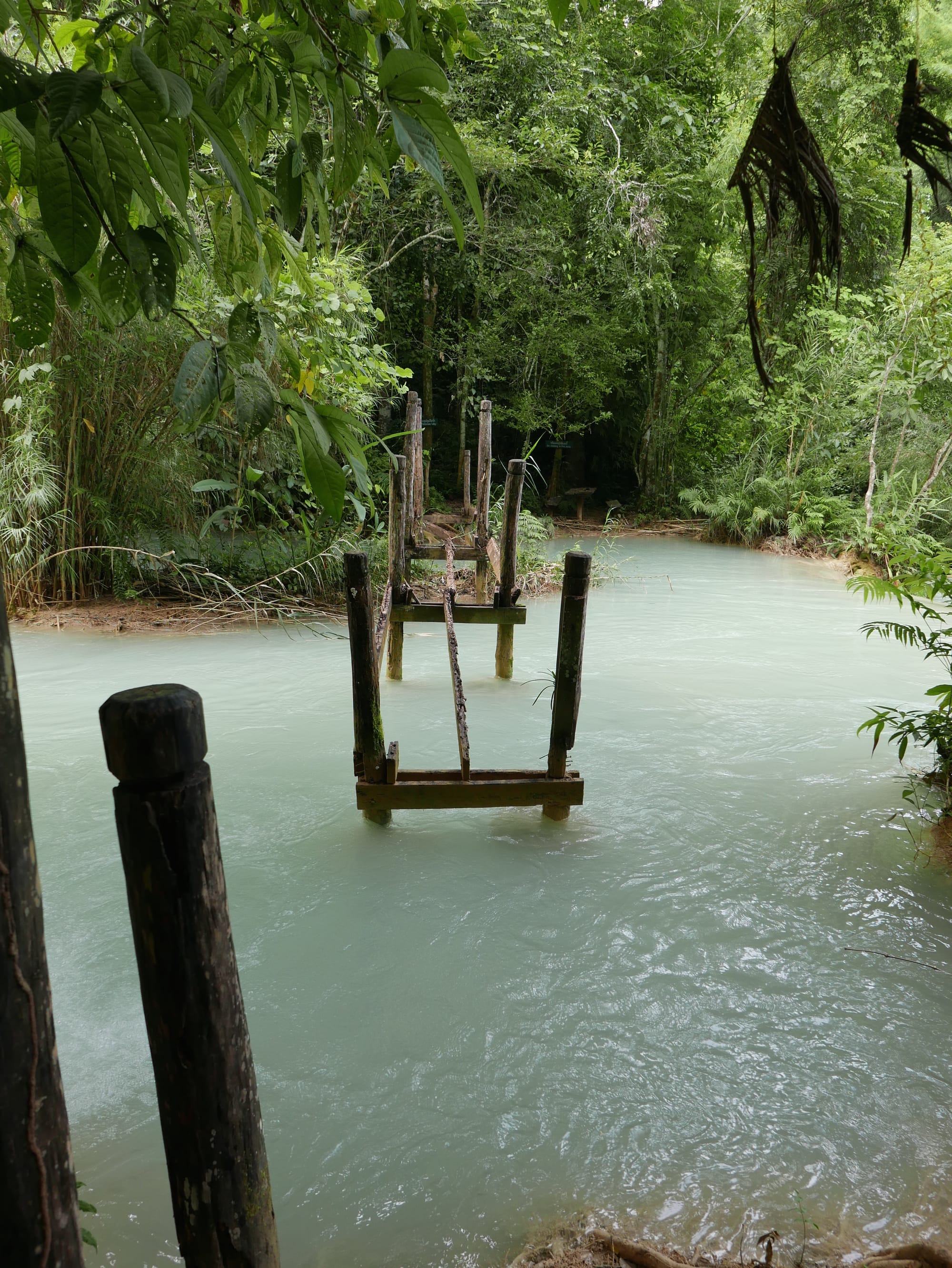 Photo by Author — what bridge? — Kuang Si Waterfall (ນ້ຳຕົກຕາດ ກວາງຊີ), Laos — the lower pools