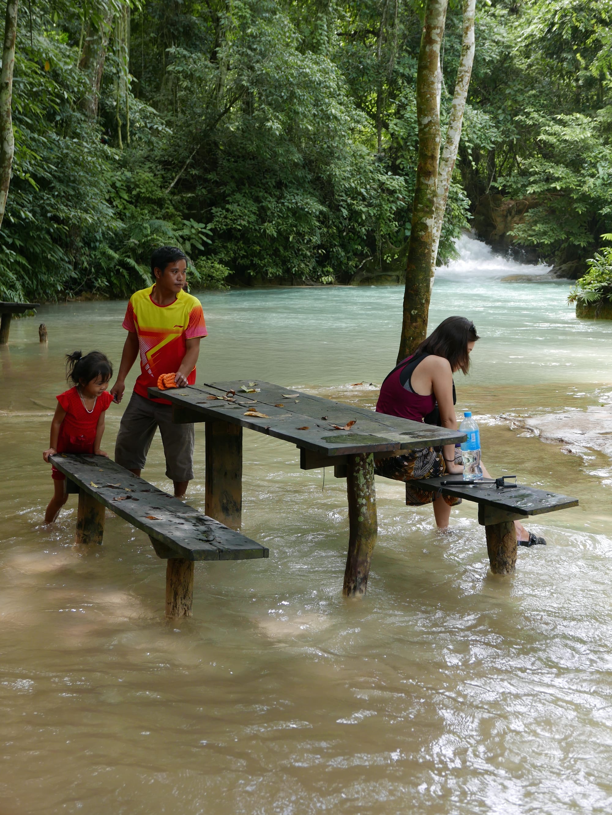 Photo by Author — picnic table — Kuang Si Waterfall (ນ້ຳຕົກຕາດ ກວາງຊີ), Laos — the lower pools