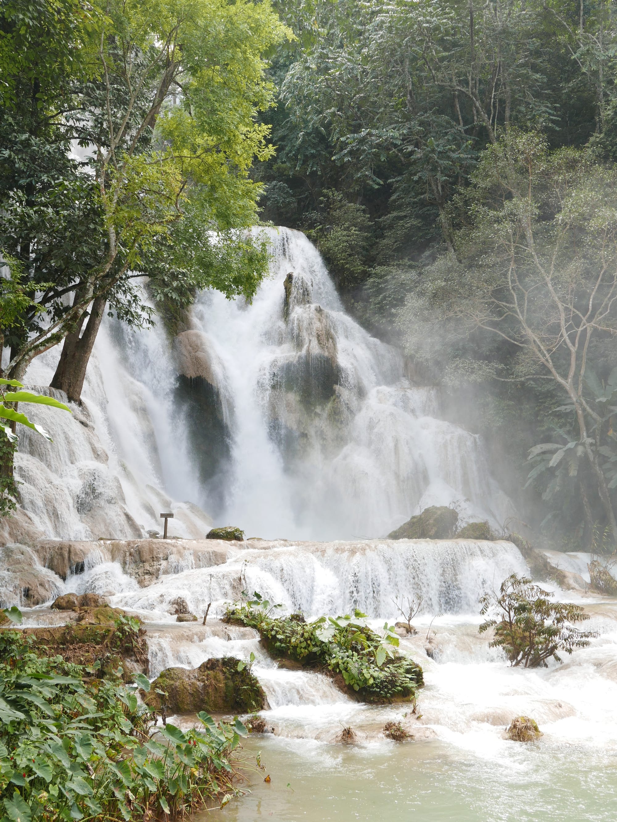 Photo by Author — a large waterfall at Kuang Si Waterfall (ນ້ຳຕົກຕາດ ກວາງຊີ), Laos — the lower pools