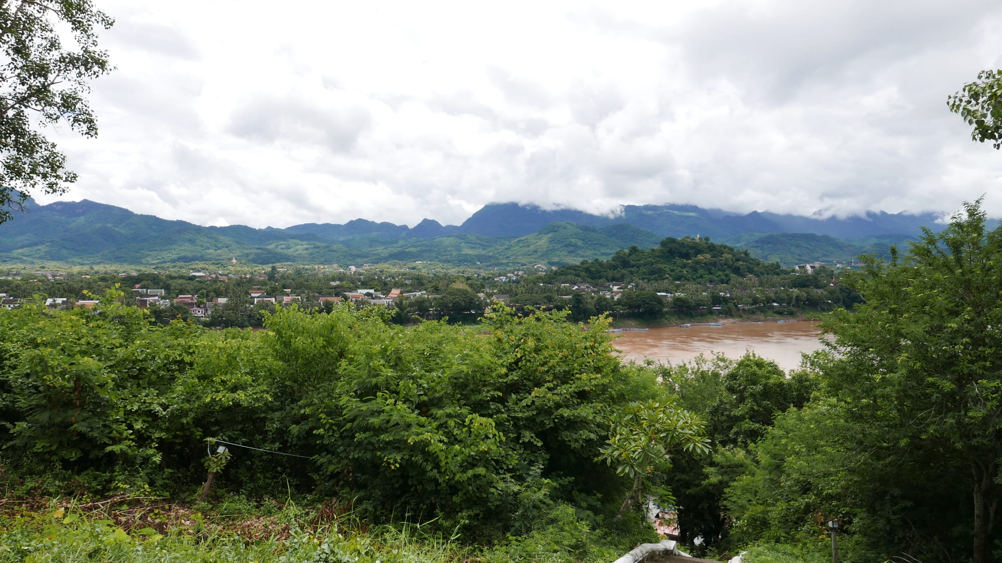 Photo by Author — view of Luang Prabang and the Mekong River from Chomphet Temple (Wat Chomphet)