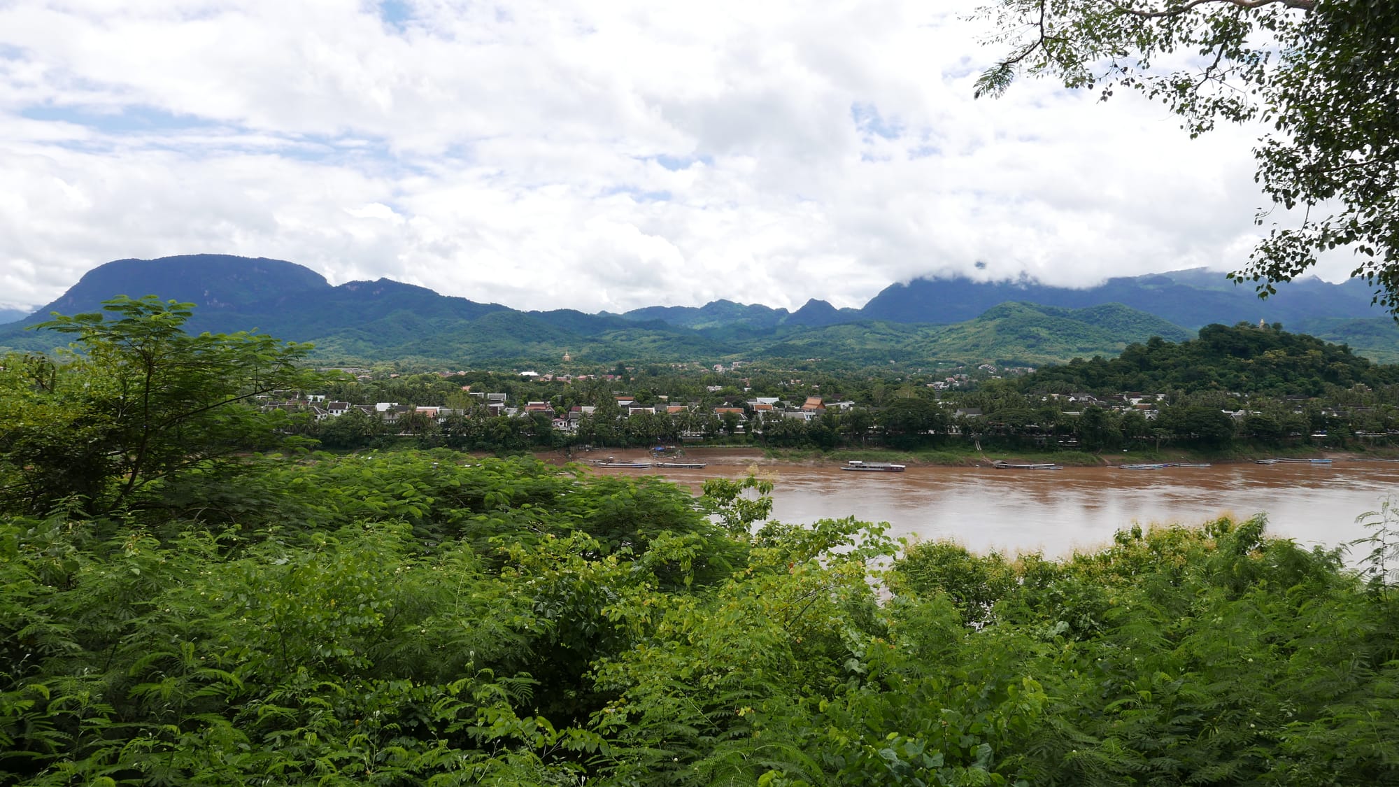 Photo by Author — view of Luang Prabang and the Mekong River from Chomphet Temple (Wat Chomphet)